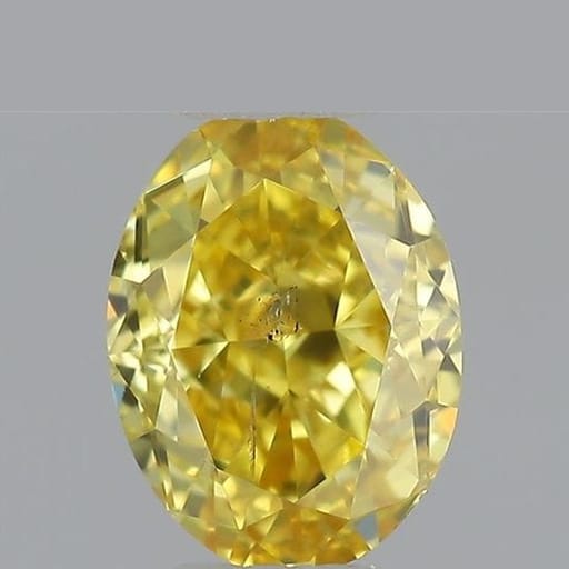 0.28 Carat Oval Yellow Diamond