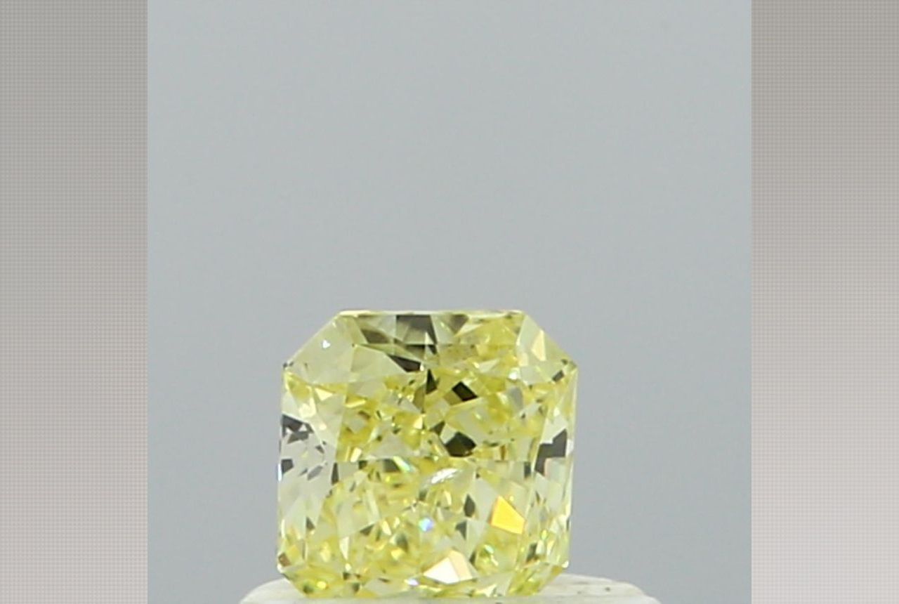 0.36 Carat Radiant Yellow Diamond