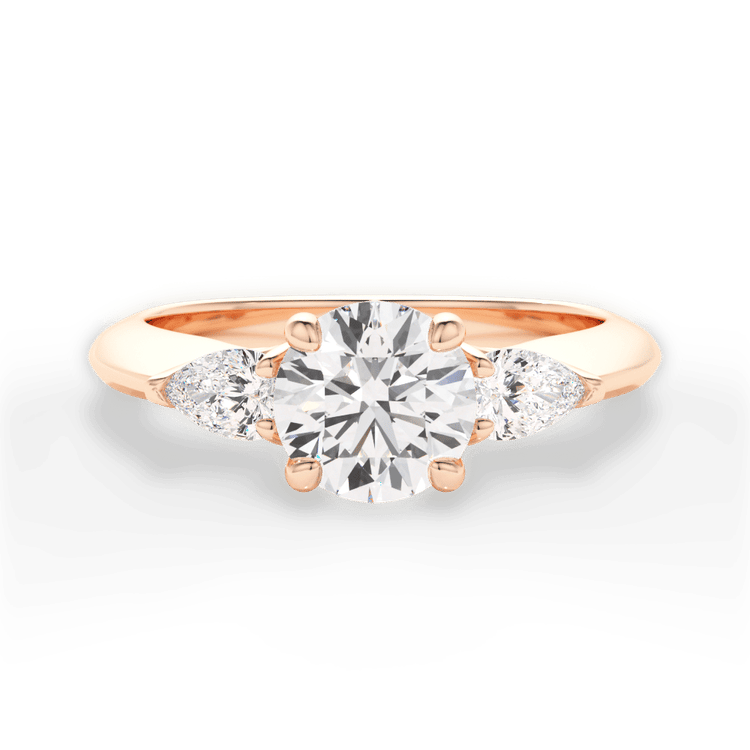 The Ava Round Cut 18kt Rose Gold Three-Stone Diamond Engagement Ring