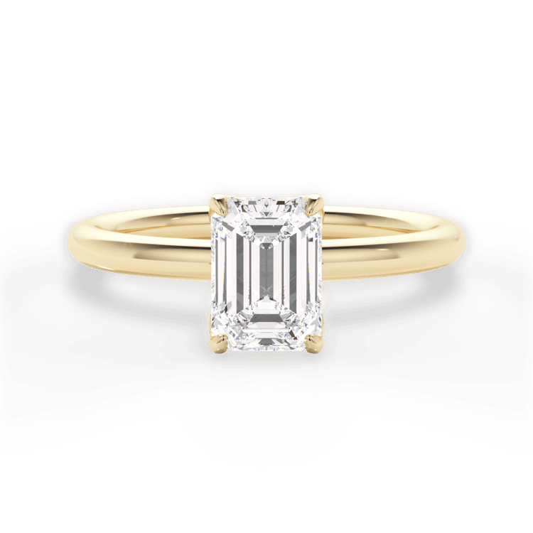 The Ora Emerald Cut 18kt Yellow Gold Petal Head Solitaire Engagement Ring