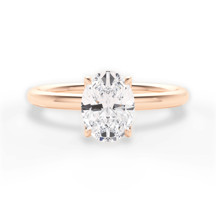 The Ora Oval Cut 18kt Rose Gold Petal Head Solitaire Engagement Ring