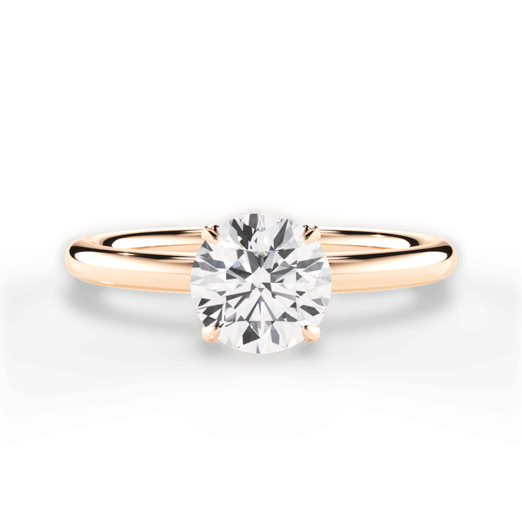 The Ora Round Cut 18kt Rose Gold Petal Head Solitaire Engagement Ring