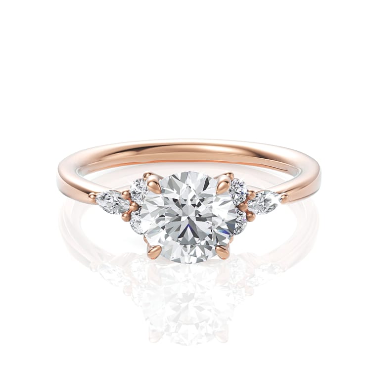 The Anastasia Round Cut 18kt Rose Gold Sidestone Diamond Engagement Ring