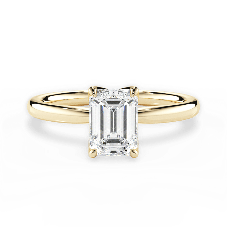 The Nivea Emerald Cut 18kt Yellow Gold Petal Solitaire Engagement Ring