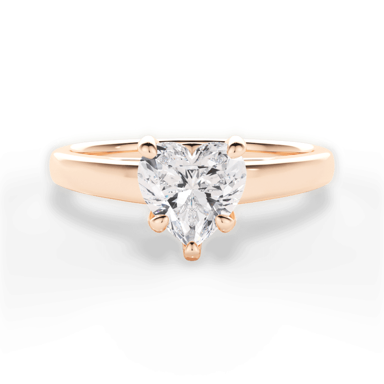 The Samira Heart Shaped 18kt Rose Gold Solitaire Cathedral Engagement Ring with Surprise Diamonds