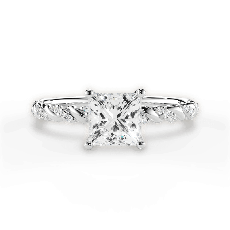 The Luna Pear Shaped Platinum Half Diamond Twist Engagement Ring