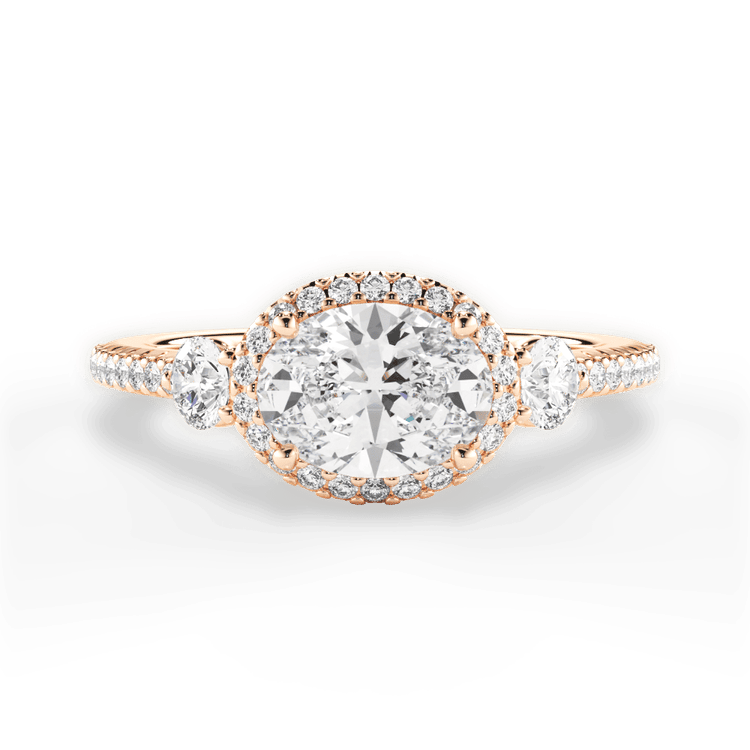 The Emelia Oval Cut 18kt Rose Gold East To West Three-Stone Halo Diamond Band Engagement Ring