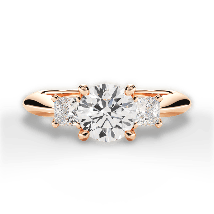 The Ellie Round Cut 18kt Rose Gold Three-Stone Solitaire Engagement Ring