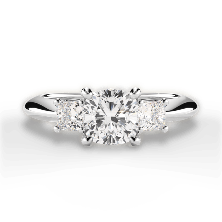 The Ellie Cushion Cut Platinum Three-Stone Solitaire Engagement Ring
