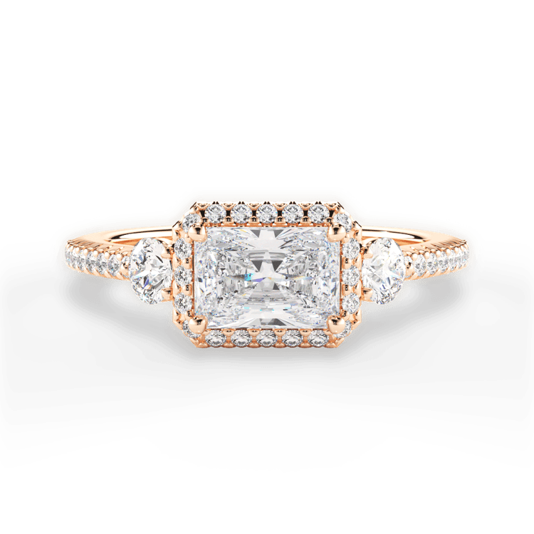 The Emelia Radiant Cut 18kt Rose Gold East To West Three-Stone Halo Diamond Band Engagement Ring