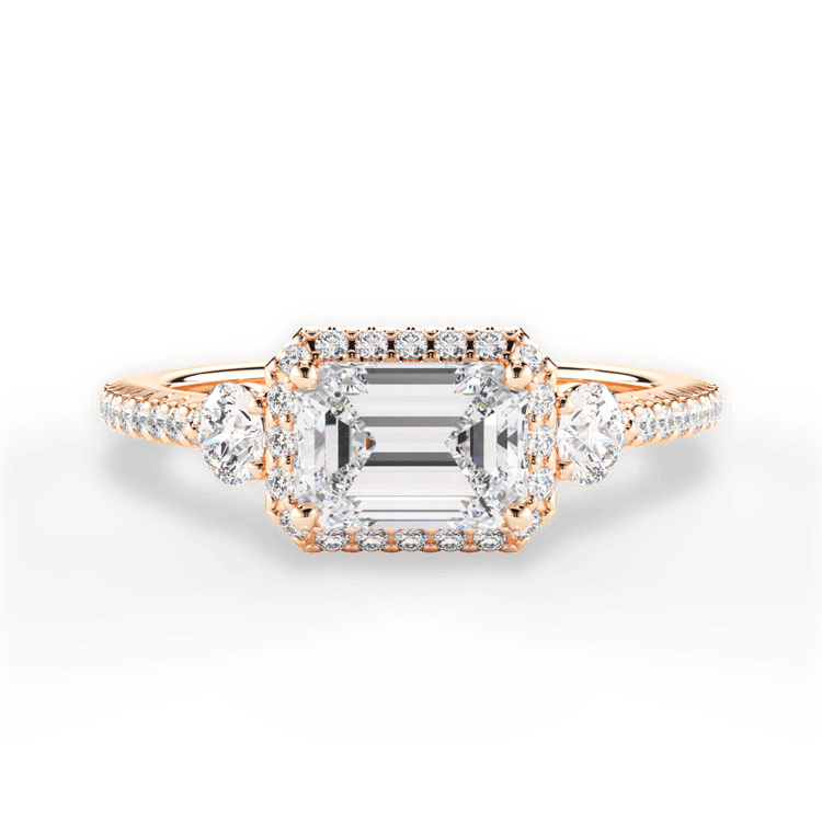 The Emelia Emerald Cut 18kt Rose Gold East To West Three-Stone Halo Diamond Band Engagement Ring