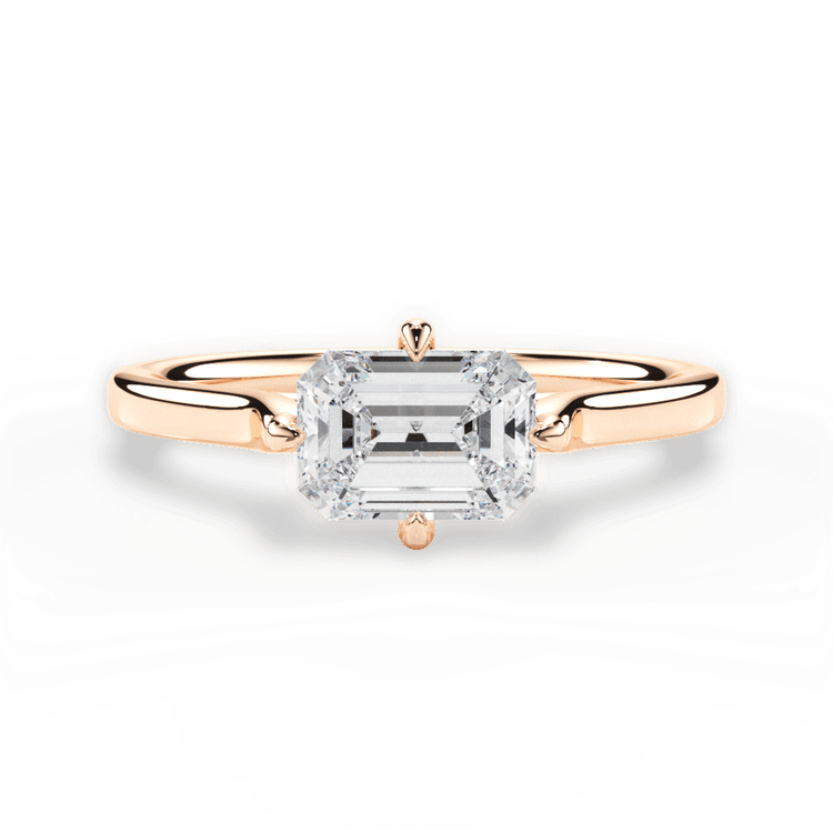 The Kat Emerald Cut 18kt Rose Gold Kite-Set Solitaire Engagement Ring