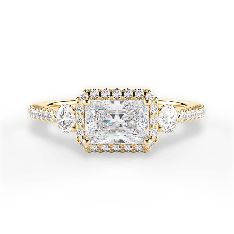 The Emelia Radiant Cut 18kt Yellow Gold East To West Three-Stone Halo Diamond Band Engagement Ring
