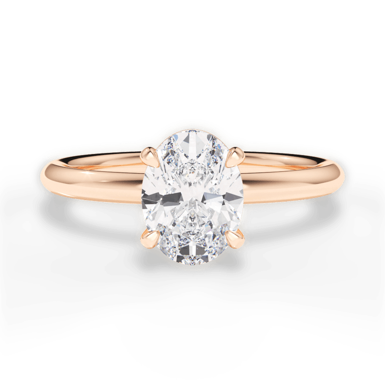 The Stella Oval Cut 18kt Rose Gold Classic Solitaire Engagement Ring with Hidden Halo