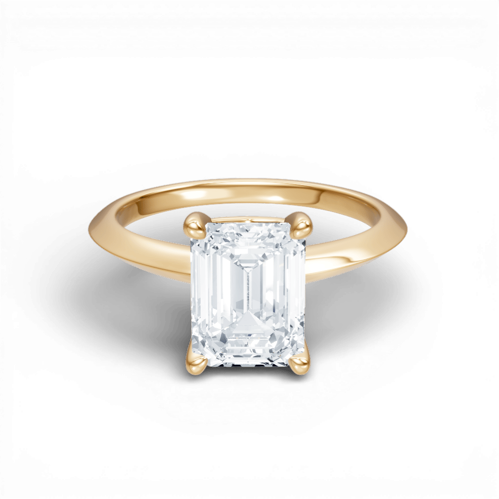 The Orielle Emerald Cut 14kt Yellow Gold Four-Prong Solitaire Engagement Ring