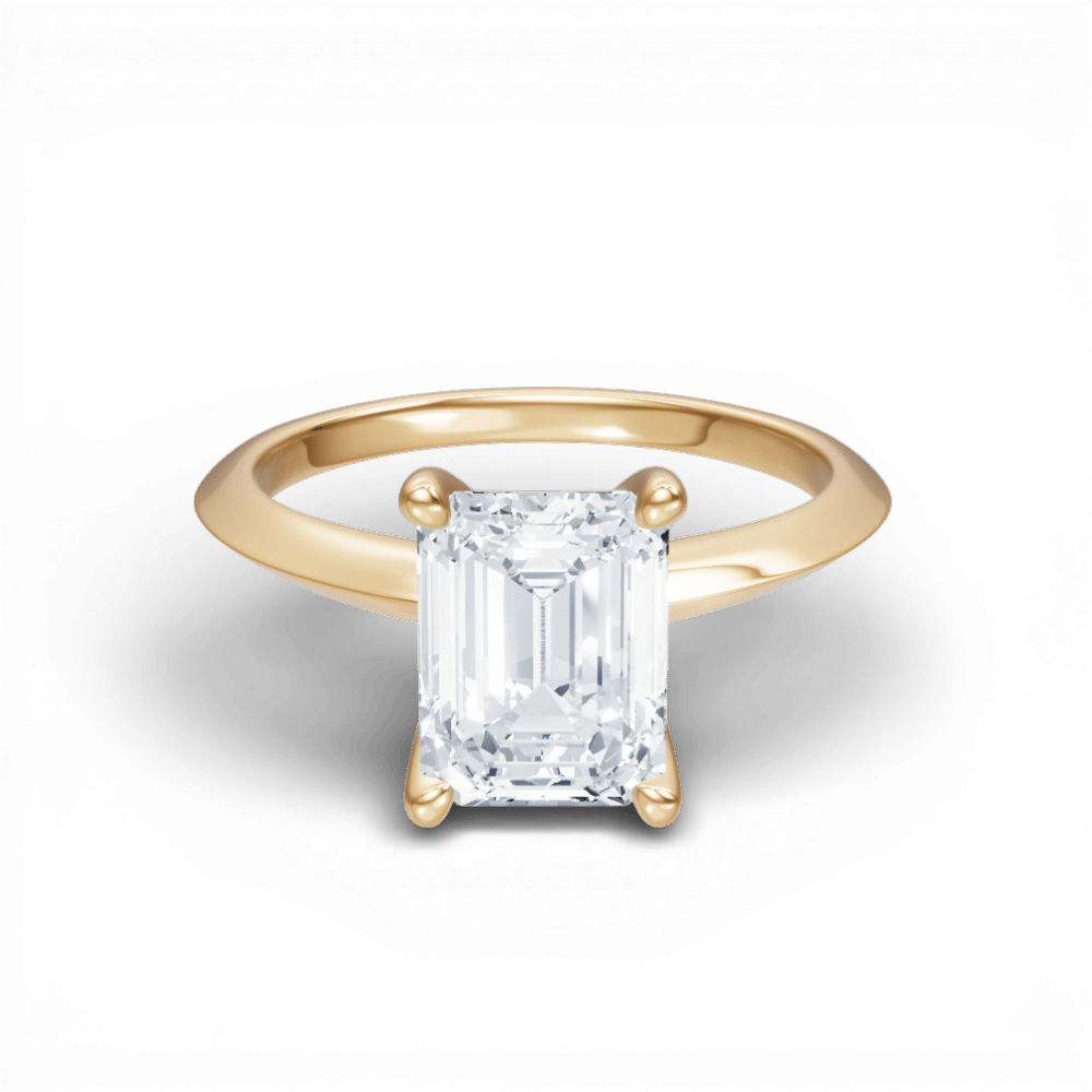 The Teya Emerald Cut 14kt Yellow Gold Four-Prong Solitaire Engagement Ring