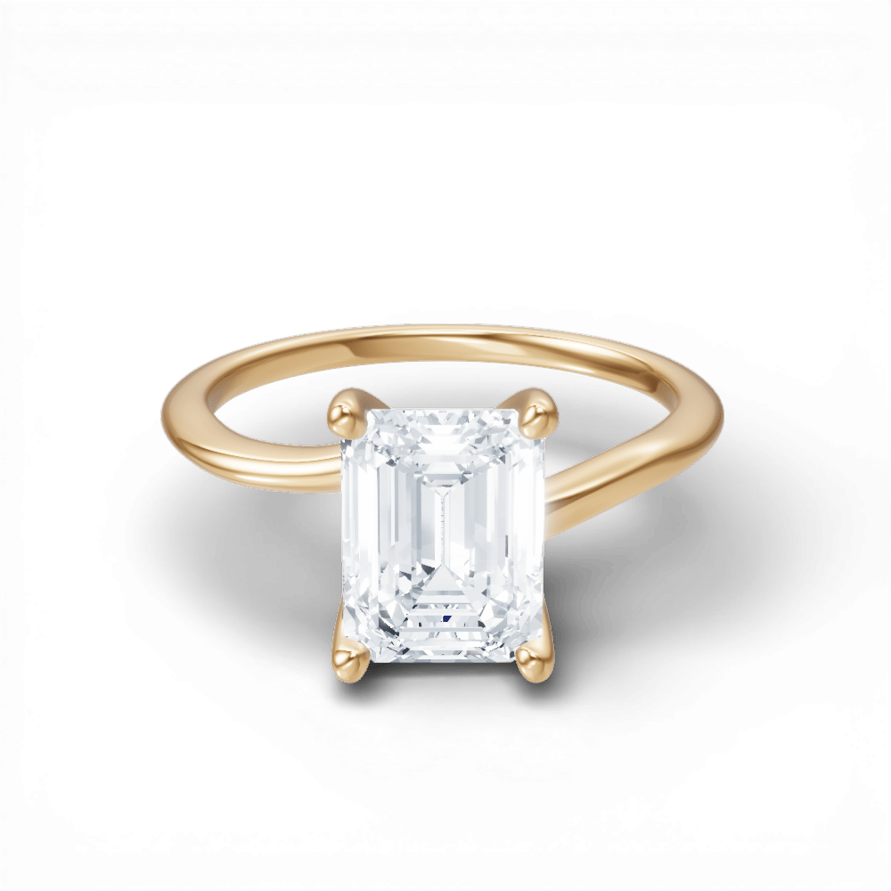 The Geneva Emerald Cut 18kt Yellow Gold Four-Prong Solitaire Engagement Ring