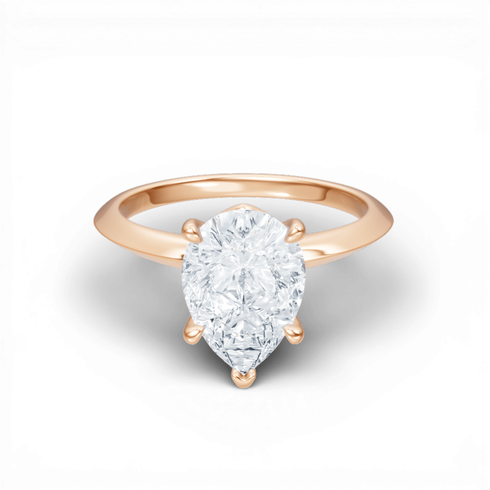The Orielle Pear Cut 18kt Rose Gold Four-Prong Solitaire Engagement Ring