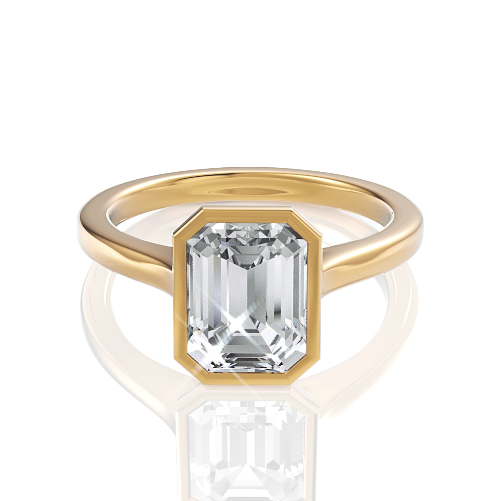 The Dara Emerald Cut 18kt Yellow Gold Bezel-Set Solitaire Engagement Ring