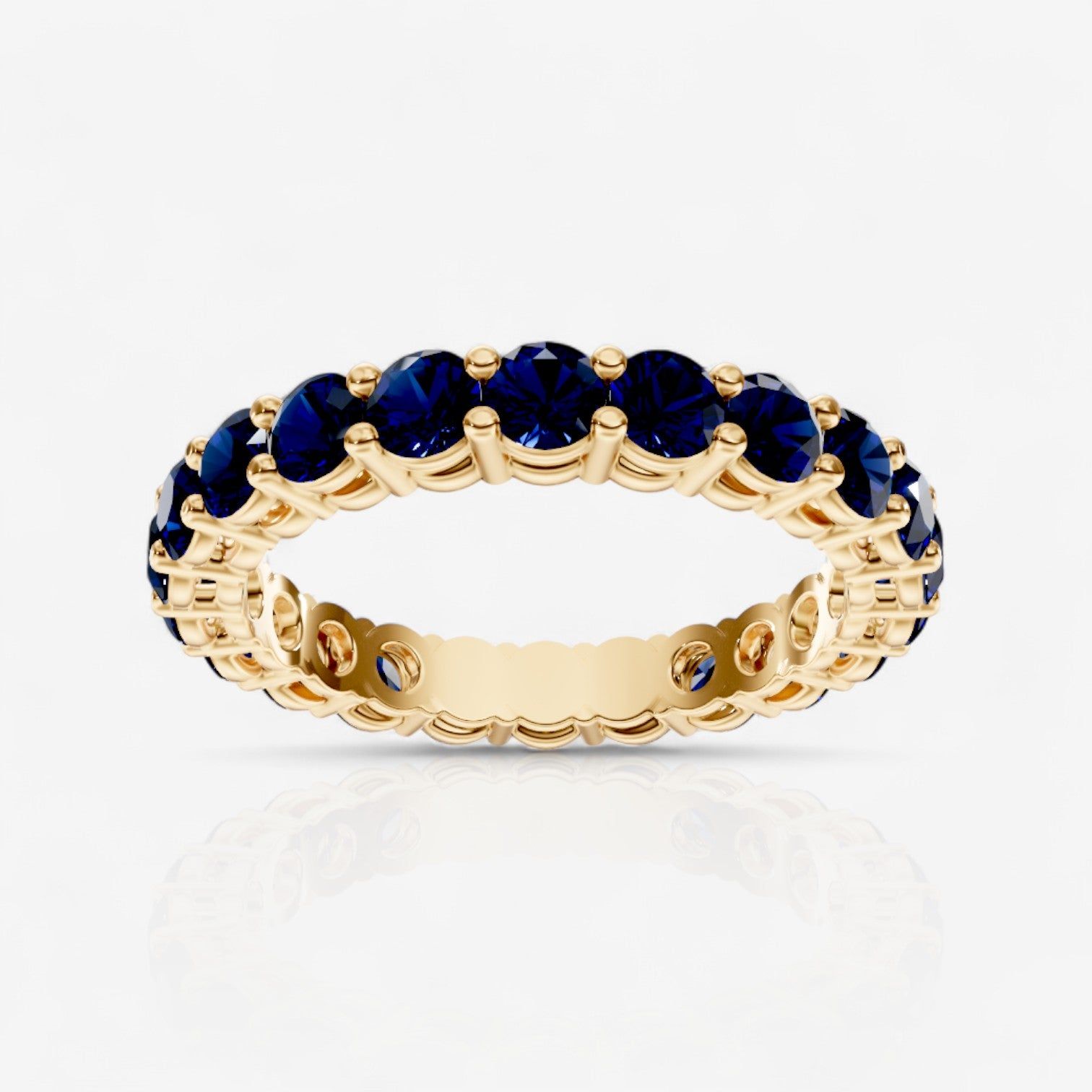 Round Shared Prong Sapphire Eternity Band