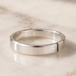 plain mens band on marble table