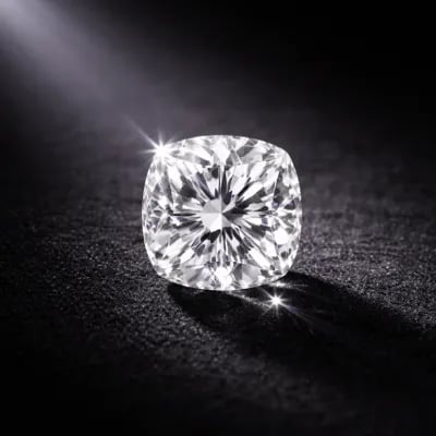 cushion cut diamond on a black background