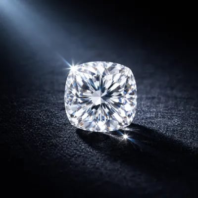 cushion cut natural diamond on a black background