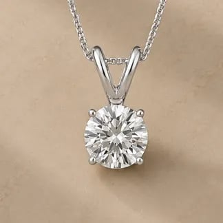 round cut diamond pendant on chain