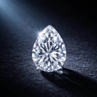 pear cut natural diamond on a black background