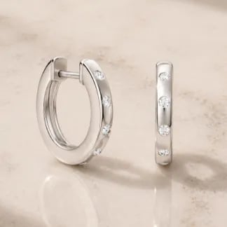 white gold huggie earrings
