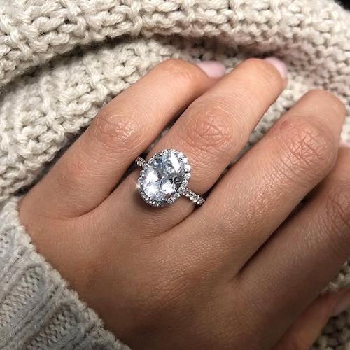 oval engagement ring with diamond halo